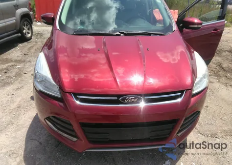 2015 Ford Escape Titanium z USA, uszkodzony, nr VIN 1FMCU0JX7FUC85628